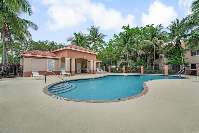 3810 N Jog Rd Unit 204, West Palm Beach, FL 33411 - community pool featuring a patio area