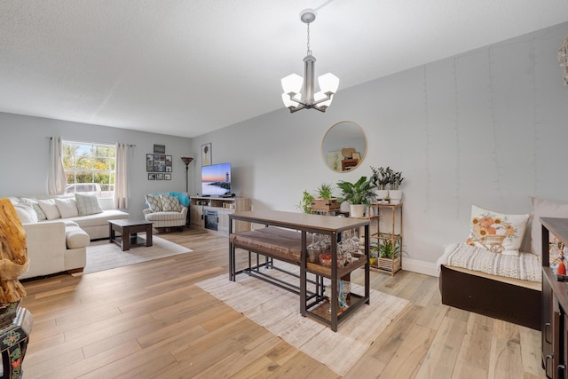 495 SE 8th St Unit 147, Deerfield Beach, FL 33441 - dining area featuring a chandelier and light wood-type flooring