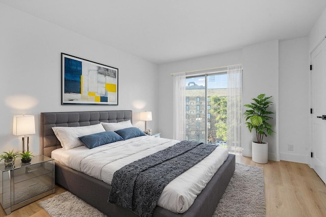 1111 S Ocean Blvd Unit 313, Boca Raton, FL 33432 - bedroom with light wood finished floors and baseboards