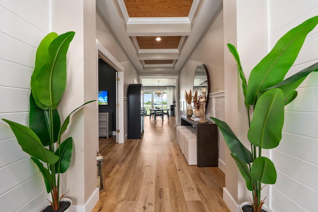 18102 Bridle Way, Port Saint Lucie, FL 34987 - corridor with coffered ceiling, wood finished floors, a chandelier, beam ceiling, and ornamental molding