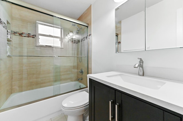1184 Landings Run, Greenacres, FL 33413 - bathroom featuring vanity, toilet, and combined bath / shower with glass door
