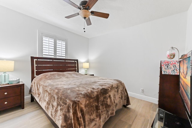 1184 Landings Run, Greenacres, FL 33413 - bedroom featuring light wood-style flooring, baseboards, and a ceiling fan
