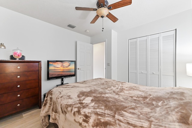 1184 Landings Run, Greenacres, FL 33413 - bedroom featuring light wood-style flooring, a closet, and ceiling fan