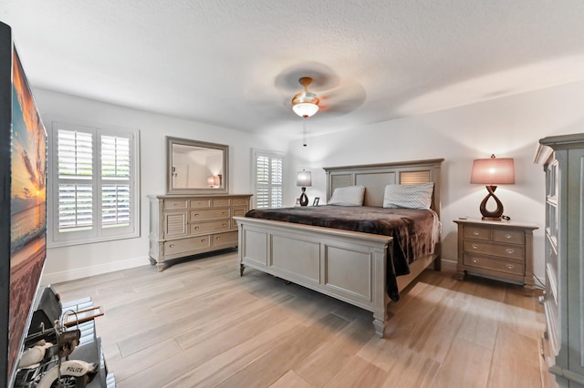 1184 Landings Run, Greenacres, FL 33413 - bedroom with light wood-type flooring, baseboards, and ceiling fan