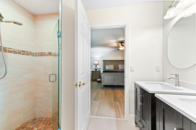 1184 Landings Run, Greenacres, FL 33413 - full bathroom with ensuite bath, a ceiling fan, a shower stall, and double vanity