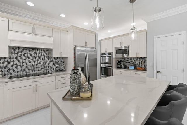 2371 Simonson Dr, Wellington, FL 33414 - kitchen featuring appliances with stainless steel finishes, ornamental molding, backsplash, a breakfast bar area, and decorative light fixtures