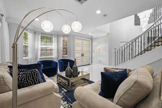 2371 Simonson Dr, Wellington, FL 33414 - living room with crown molding, stairway, french doors, recessed lighting, and baseboards