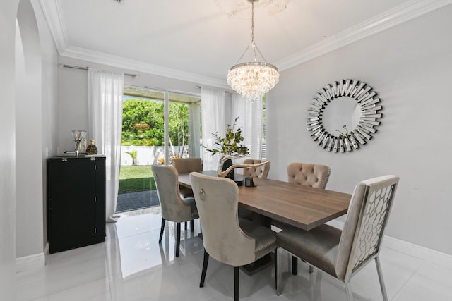 2371 Simonson Dr, Wellington, FL 33414 - dining room featuring ornamental molding, a chandelier, baseboards, and arched walkways
