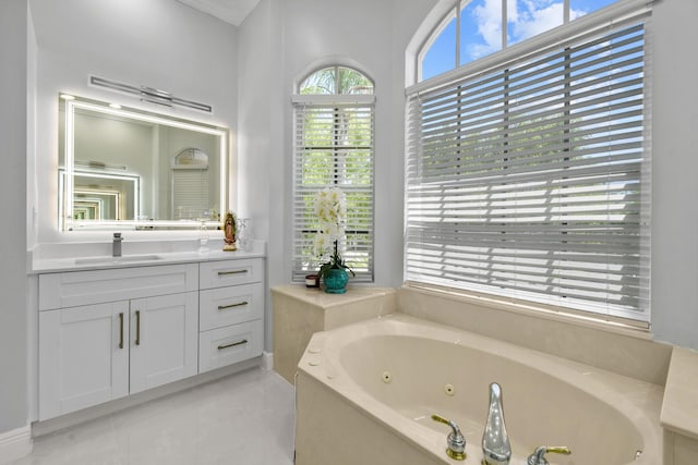 2371 Simonson Dr, Wellington, FL 33414 - bathroom featuring a whirlpool tub, vanity, and tile patterned floors