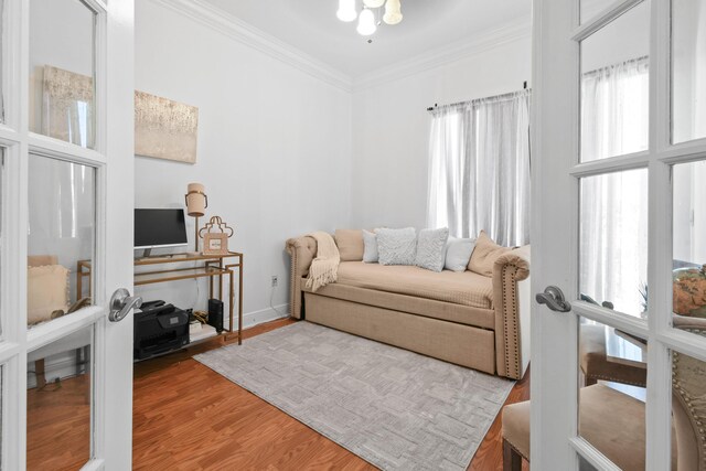 2371 Simonson Dr, Wellington, FL 33414 - living room with ornamental molding, wood finished floors, and baseboards