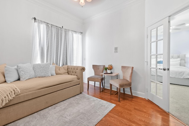 2371 Simonson Dr, Wellington, FL 33414 - living area featuring ornamental molding, a ceiling fan, wood finished floors, and baseboards