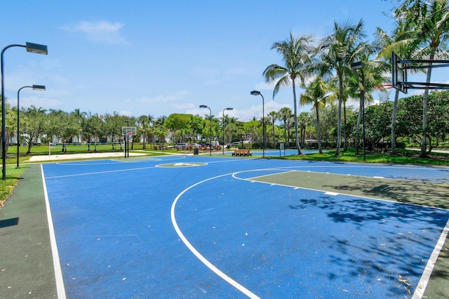 2371 Simonson Dr, Wellington, FL 33414 - view of sport court with community basketball court and view of scattered trees