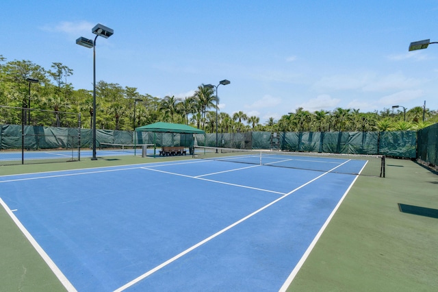 2371 Simonson Dr, Wellington, FL 33414 - view of tennis court with community basketball court