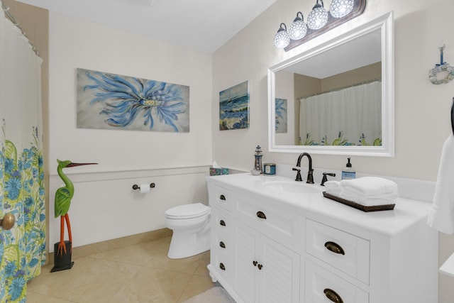 2855 Eagle Ln, West Palm Beach, FL 33409 - bathroom featuring toilet, tile patterned floors, vanity, baseboards, and a shower with shower curtain