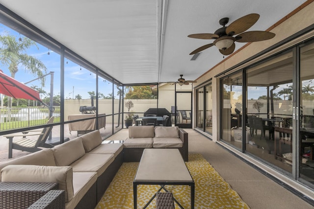2855 Eagle Ln, West Palm Beach, FL 33409 - sunroom featuring ceiling fan and an outdoor living space