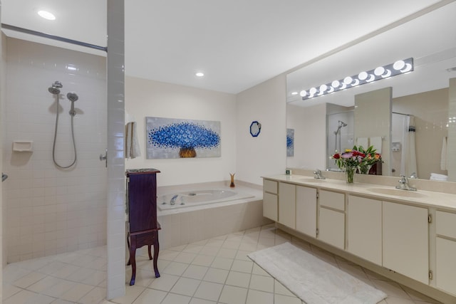 2855 Eagle Ln, West Palm Beach, FL 33409 - bathroom featuring tiled shower, double vanity, tile patterned floors, a garden tub, and recessed lighting