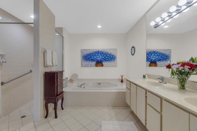 2855 Eagle Ln, West Palm Beach, FL 33409 - bathroom with a bath, tile patterned flooring, walk in shower, double vanity, and recessed lighting
