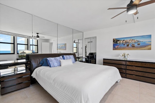 2800 N Ocean Dr Unit B-24D, Singer Island, FL 33404 - bedroom featuring light tile patterned flooring and a ceiling fan