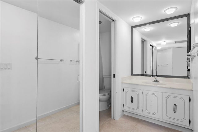 2800 N Ocean Dr Unit B-24D, Singer Island, FL 33404 - bathroom with vanity, tile patterned floors, toilet, and baseboards