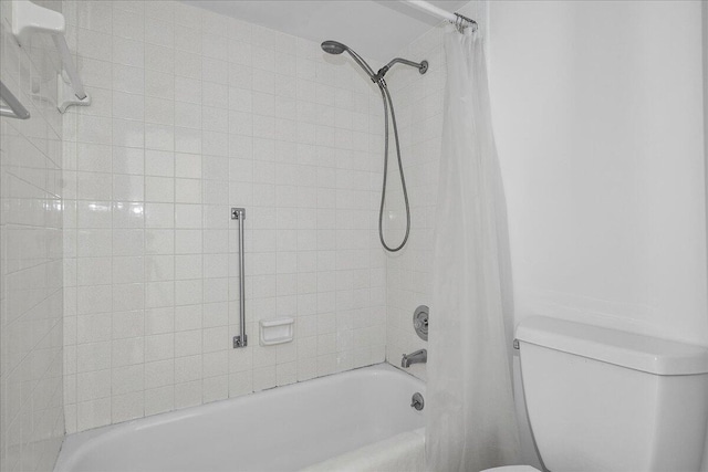 2800 N Ocean Dr Unit B-24D, Singer Island, FL 33404 - bathroom featuring shower / tub combo and toilet