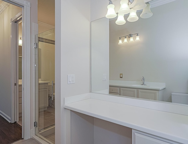 5151 Formosa Cir, Vero Beach, FL 32967 - full bathroom with a shower stall, toilet, vanity, and a chandelier