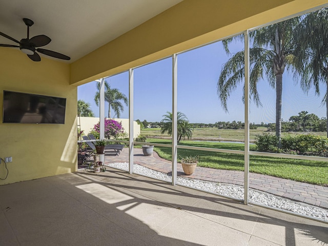 5151 Formosa Cir, Vero Beach, FL 32967 - unfurnished sunroom featuring a ceiling fan