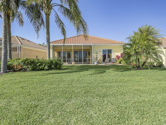 5151 Formosa Cir, Vero Beach, FL 32967 - back of property featuring a yard, a tiled roof, and stucco siding
