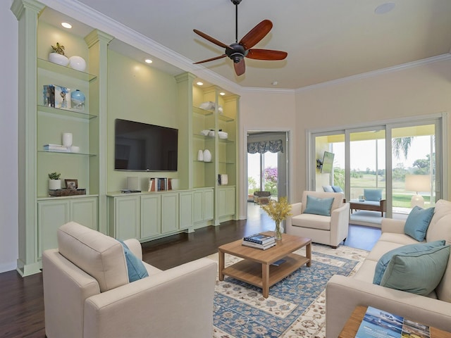5151 Formosa Cir, Vero Beach, FL 32967 - living room featuring built in features, a ceiling fan, crown molding, dark wood-style floors, and baseboards