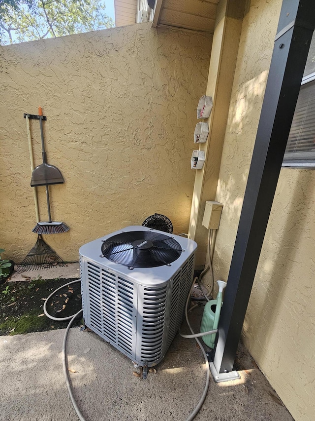 2018 S 10th St Unit C, Fort Pierce, FL 34950 - exterior view of central air condition unit and stucco siding