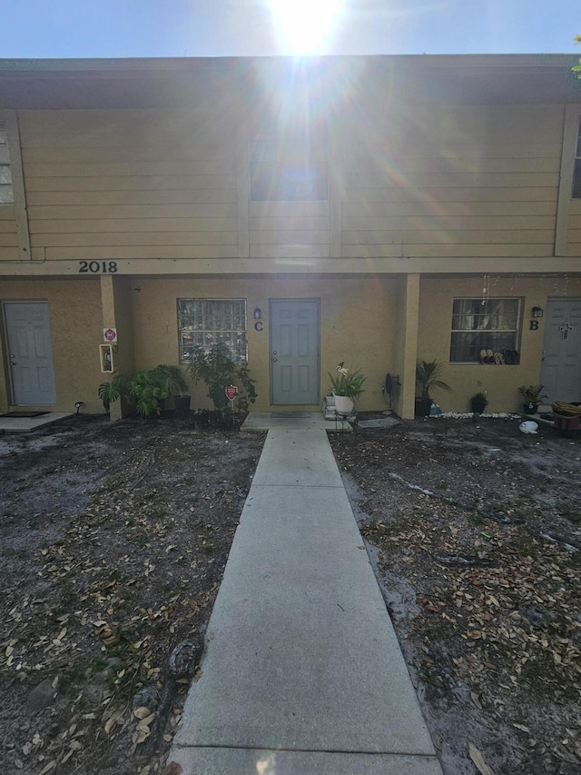2018 S 10th St Unit C, Fort Pierce, FL 34950 - view of front of property featuring stucco siding