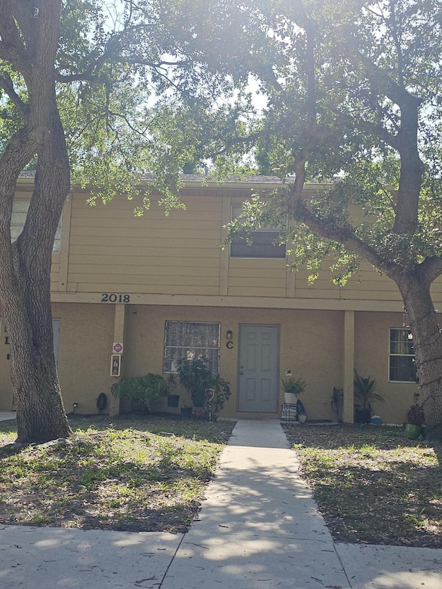 2018 S 10th St Unit C, Fort Pierce, FL 34950 - townhome / multi-family property featuring stucco siding