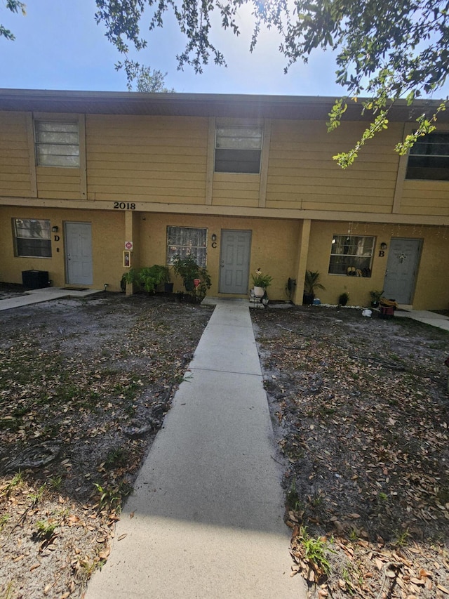 2018 S 10th St Unit C, Fort Pierce, FL 34950 - townhome / multi-family property featuring stucco siding