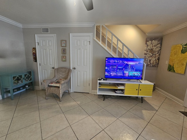 2018 S 10th St Unit C, Fort Pierce, FL 34950 - living room featuring light tile patterned floors, crown molding, stairway, baseboards, and a ceiling fan