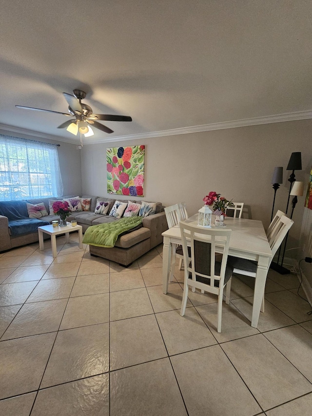 2018 S 10th St Unit C, Fort Pierce, FL 34950 - living area with light tile patterned floors, crown molding, and a ceiling fan