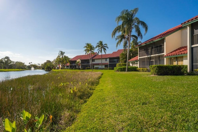 6 E Lexington Ln Unit C, Palm Beach Gardens, FL 33418 - view of grassy yard featuring a water view