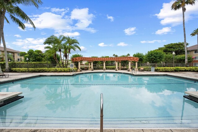 4179 N Haverhill Rd Unit 609, West Palm Beach, FL 33417 - community pool with a pergola
