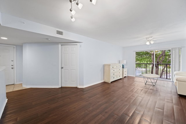 4179 N Haverhill Rd Unit 609, West Palm Beach, FL 33417 - unfurnished living room with wood finished floors, ceiling fan, and baseboards