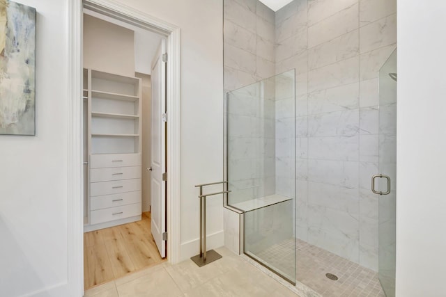 17135 SW Ambrose Way, Port Saint Lucie, FL 34986 - bathroom featuring a stall shower and a walk in closet