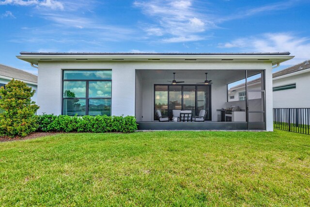 17135 SW Ambrose Way, Port Saint Lucie, FL 34986 - rear view of property with stucco siding, a ceiling fan, and a sunroom