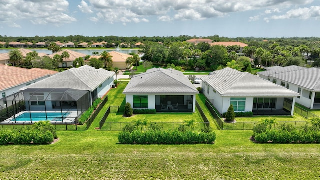 17135 SW Ambrose Way, Port Saint Lucie, FL 34986 - aerial view of residential area with a nearby body of water and a pool area