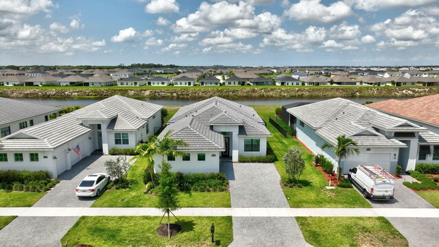 17135 SW Ambrose Way, Port Saint Lucie, FL 34986 - aerial view of residential area featuring a nearby body of water