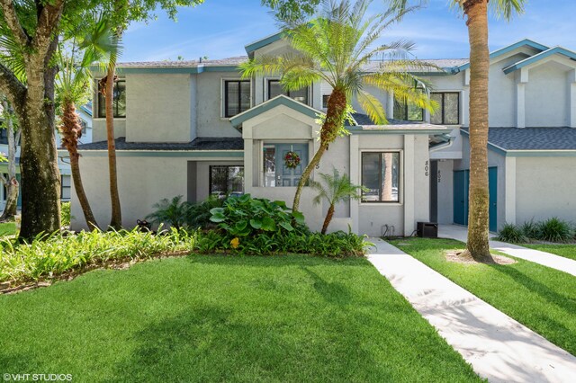 805 Harbour Pointe Way, Greenacres, FL 33413 - view of front of house featuring stucco siding and a front lawn