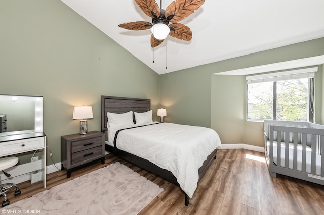 805 Harbour Pointe Way, Greenacres, FL 33413 - bedroom featuring baseboards, wood finished floors, a ceiling fan, and high vaulted ceiling