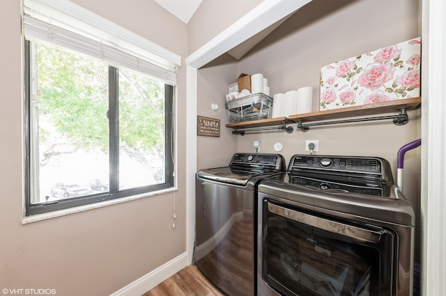 805 Harbour Pointe Way, Greenacres, FL 33413 - laundry area with separate washer and dryer, wood finished floors, and baseboards