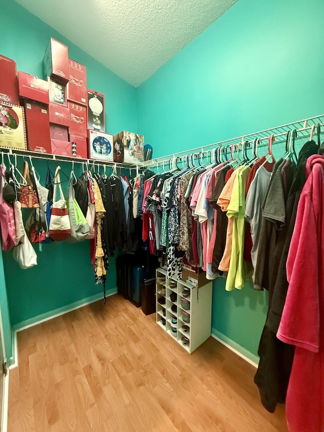 7906 Rockport Cir, Lake Worth, FL 33467 - spacious closet with wood finished floors
