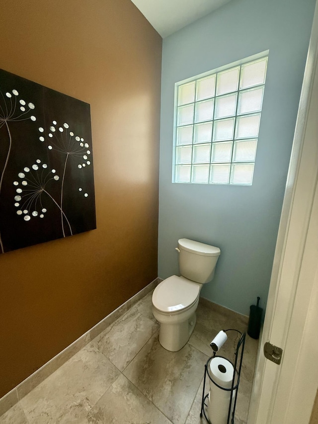 7906 Rockport Cir, Lake Worth, FL 33467 - bathroom featuring toilet and baseboards
