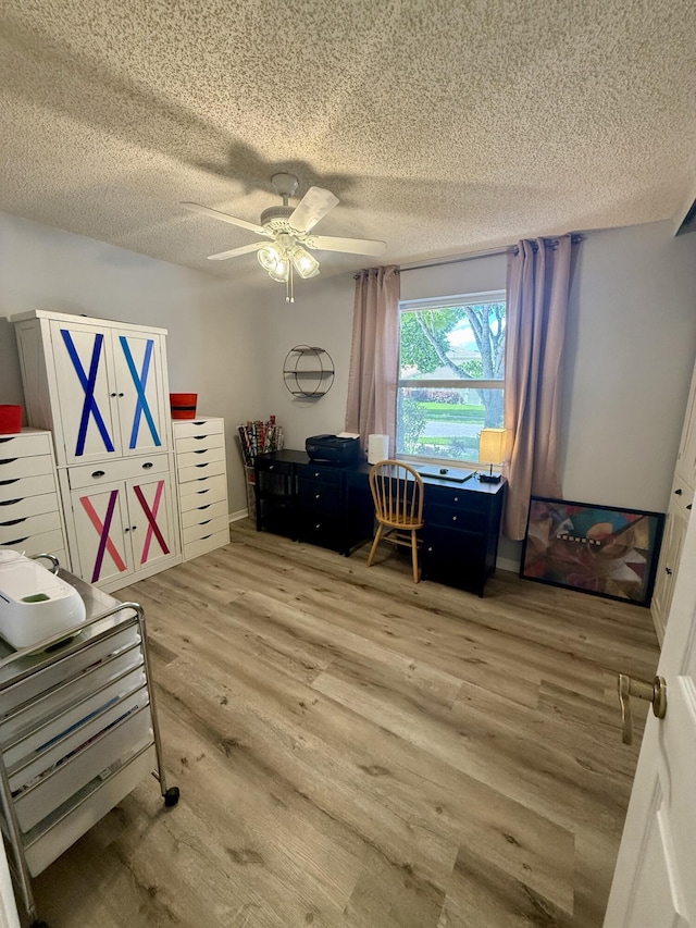 7906 Rockport Cir, Lake Worth, FL 33467 - office with wood finished floors, a textured ceiling, and ceiling fan