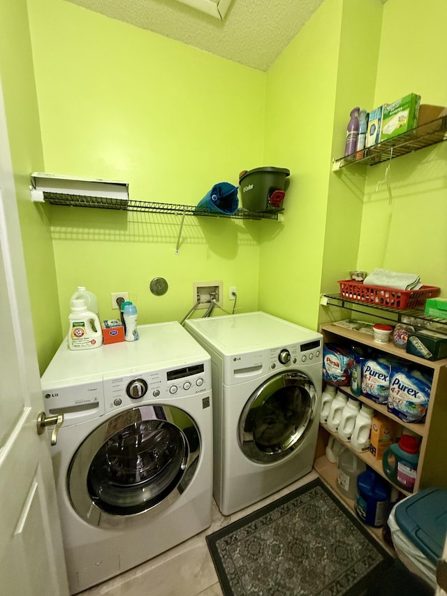 7906 Rockport Cir, Lake Worth, FL 33467 - washroom featuring washing machine and clothes dryer and a textured ceiling