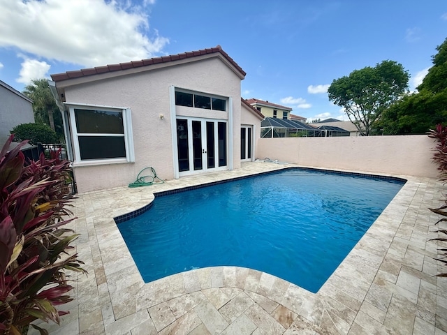 7906 Rockport Cir, Lake Worth, FL 33467 - view of pool featuring french doors, a fenced backyard, and a patio area