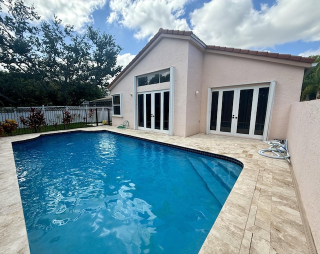 7906 Rockport Cir, Lake Worth, FL 33467 - view of swimming pool featuring french doors and a patio area